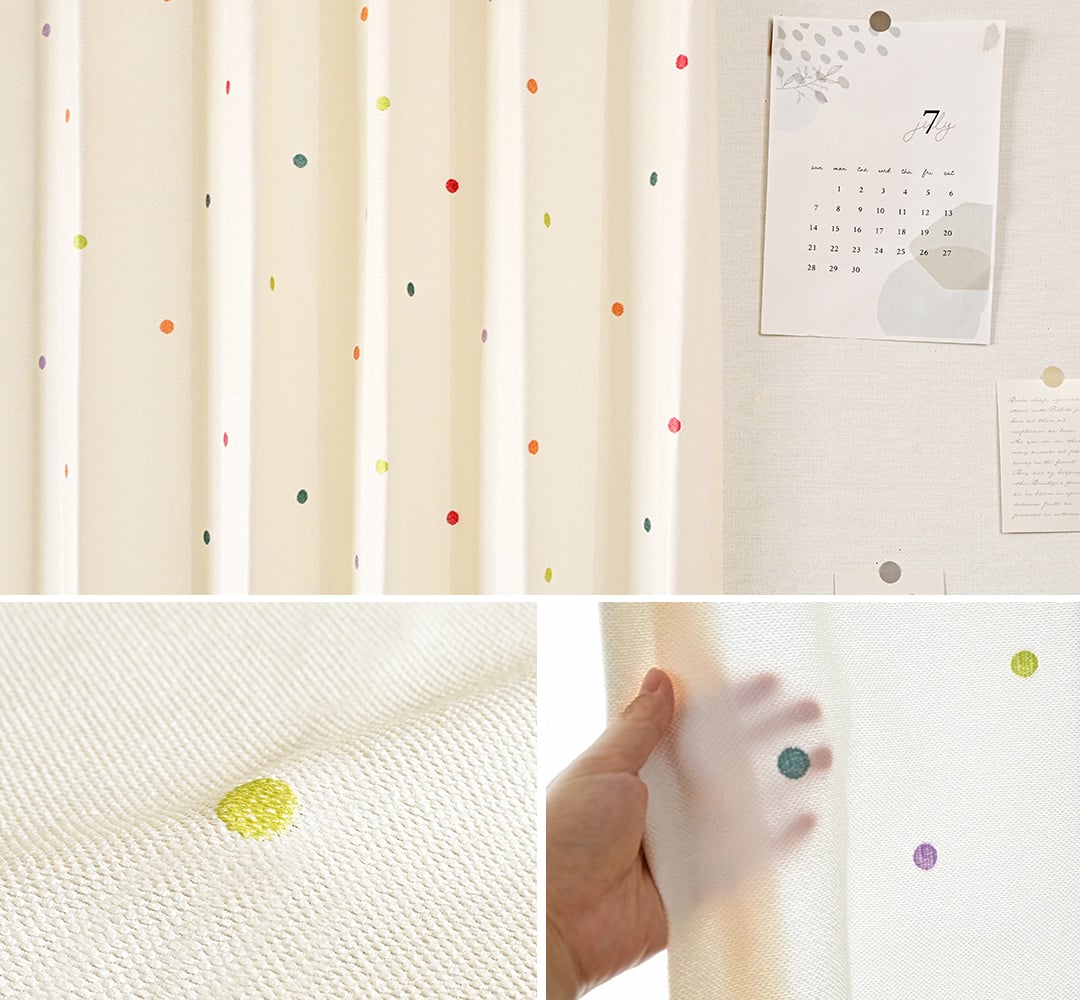 カラフルなドット柄の刺繍が施されたカーテン
